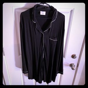 Women’s long sleeved, button front sleep shirt.